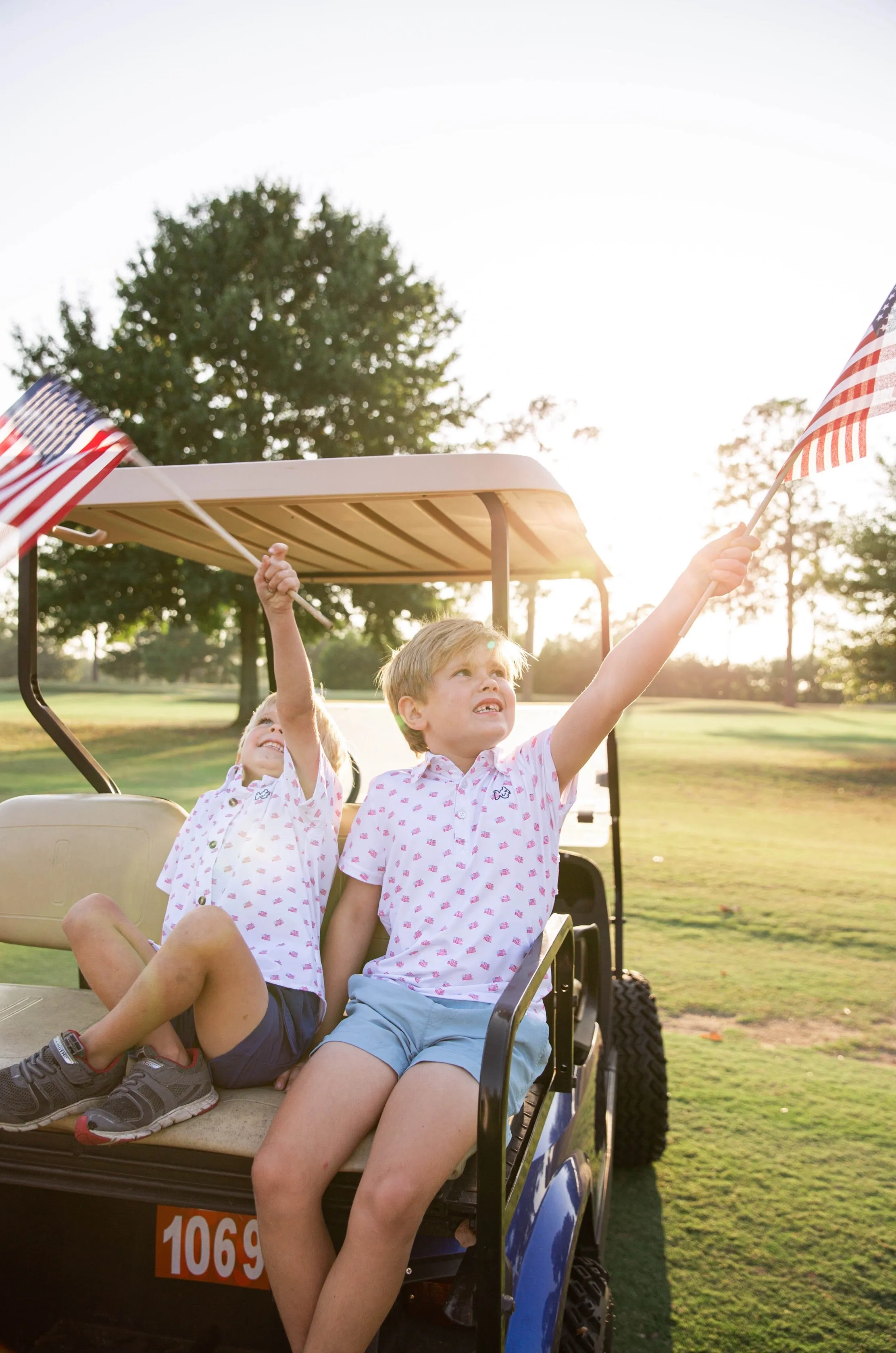 Boys Short Sleeve Pro Performance Polo in American Flag Print