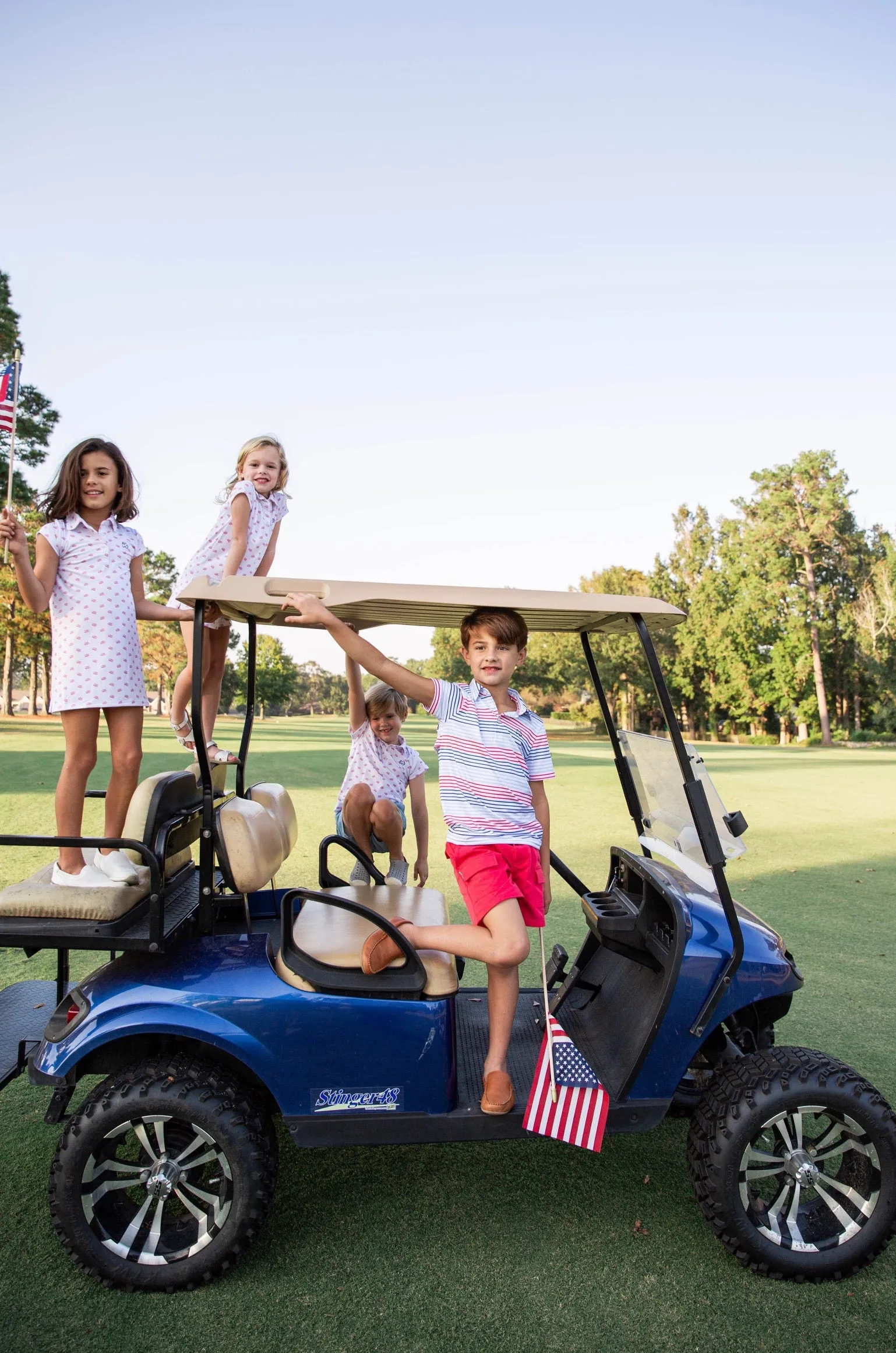 Boys Short Sleeve Pro Performance Polo in American Flag Print
