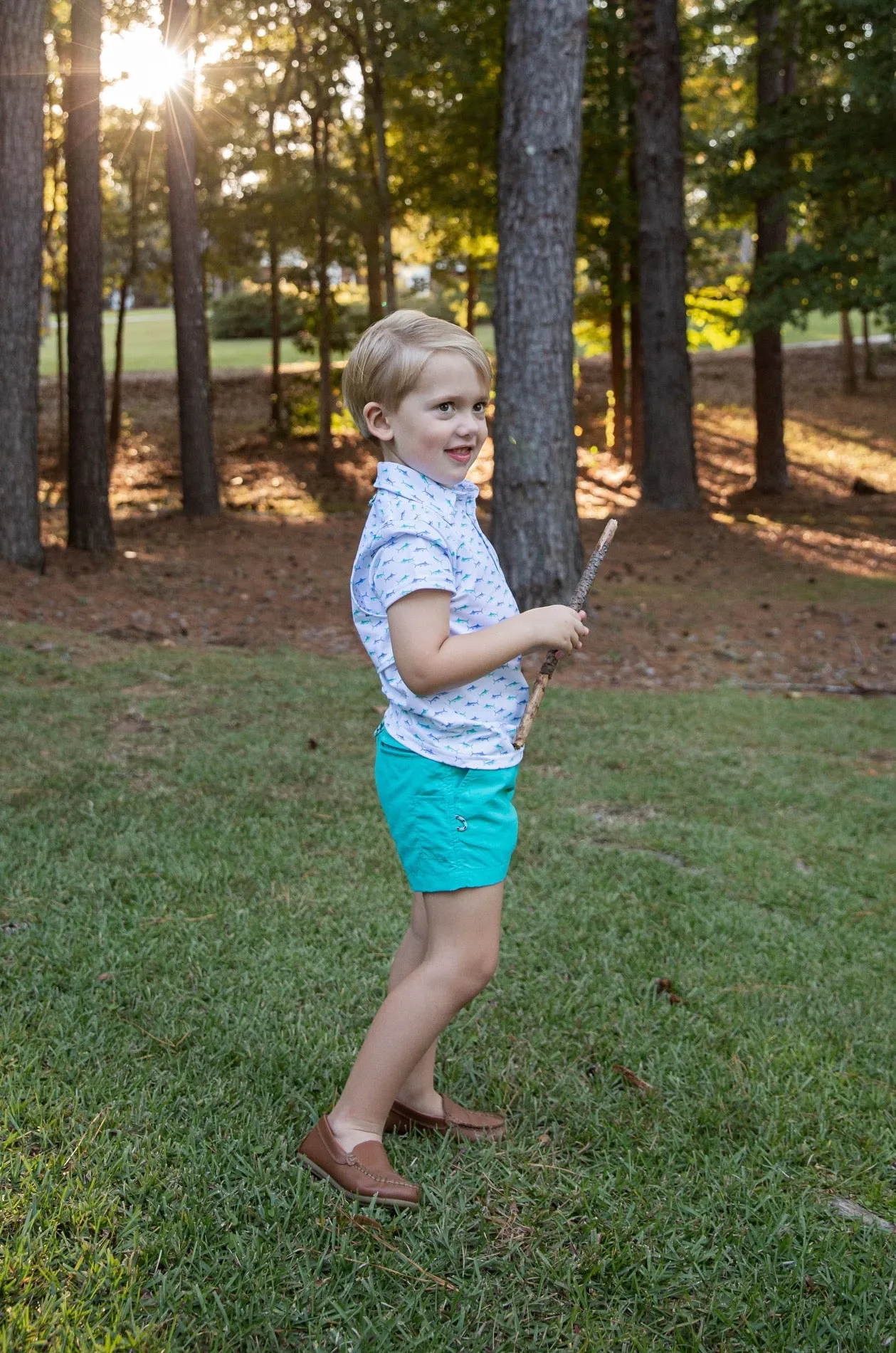 Boys Short Sleeve Pro Performance Polo in Fish Print on White