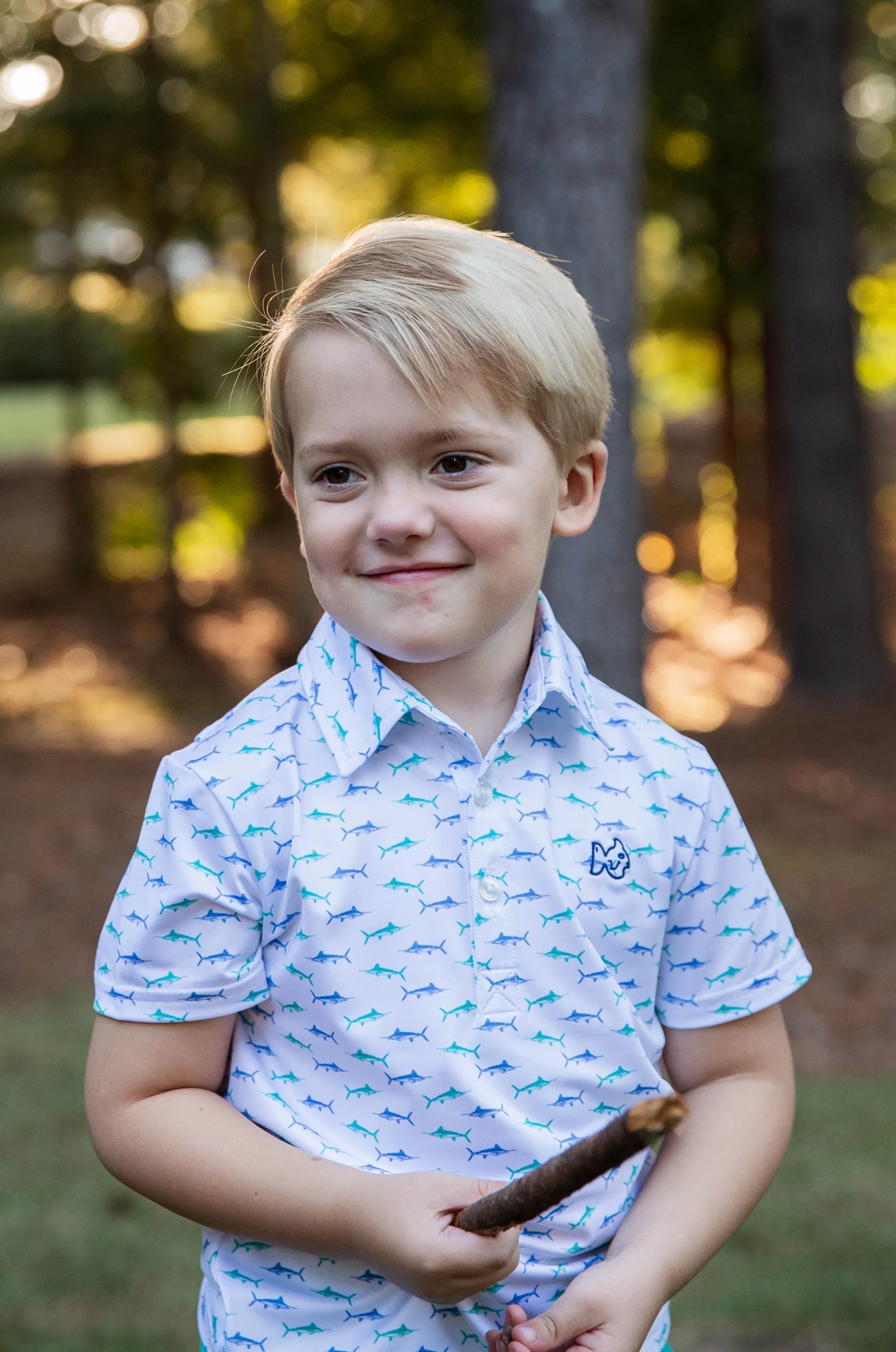 Boys Short Sleeve Pro Performance Polo in Fish Print on White